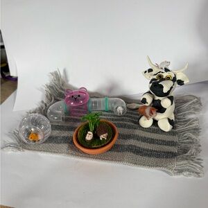 MOOre the merrier. Cow with all his animal friends